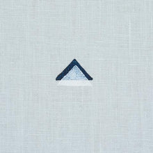 Load image into Gallery viewer, Schumacher Overlapping Triangles Fabric 74022 / Navy And White On Sky