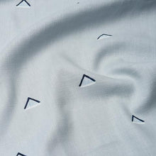 Load image into Gallery viewer, Schumacher Overlapping Triangles Fabric 74022 / Navy And White On Sky