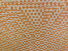 Load image into Gallery viewer, Lalla Diamond Indoor
Outdoor Fabric orange white versatile woven fabric with diamond motifs shown in terracotta