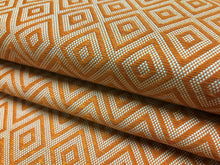 Load image into Gallery viewer, Lalla Diamond Indoor
Outdoor Fabric orange white versatile woven fabric with diamond motifs shown in terracotta